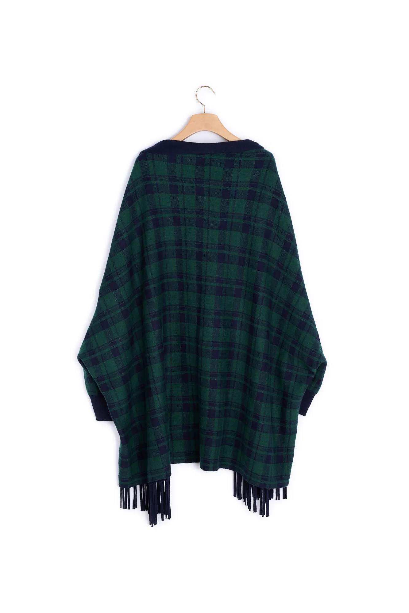 Cape en maille avec franges