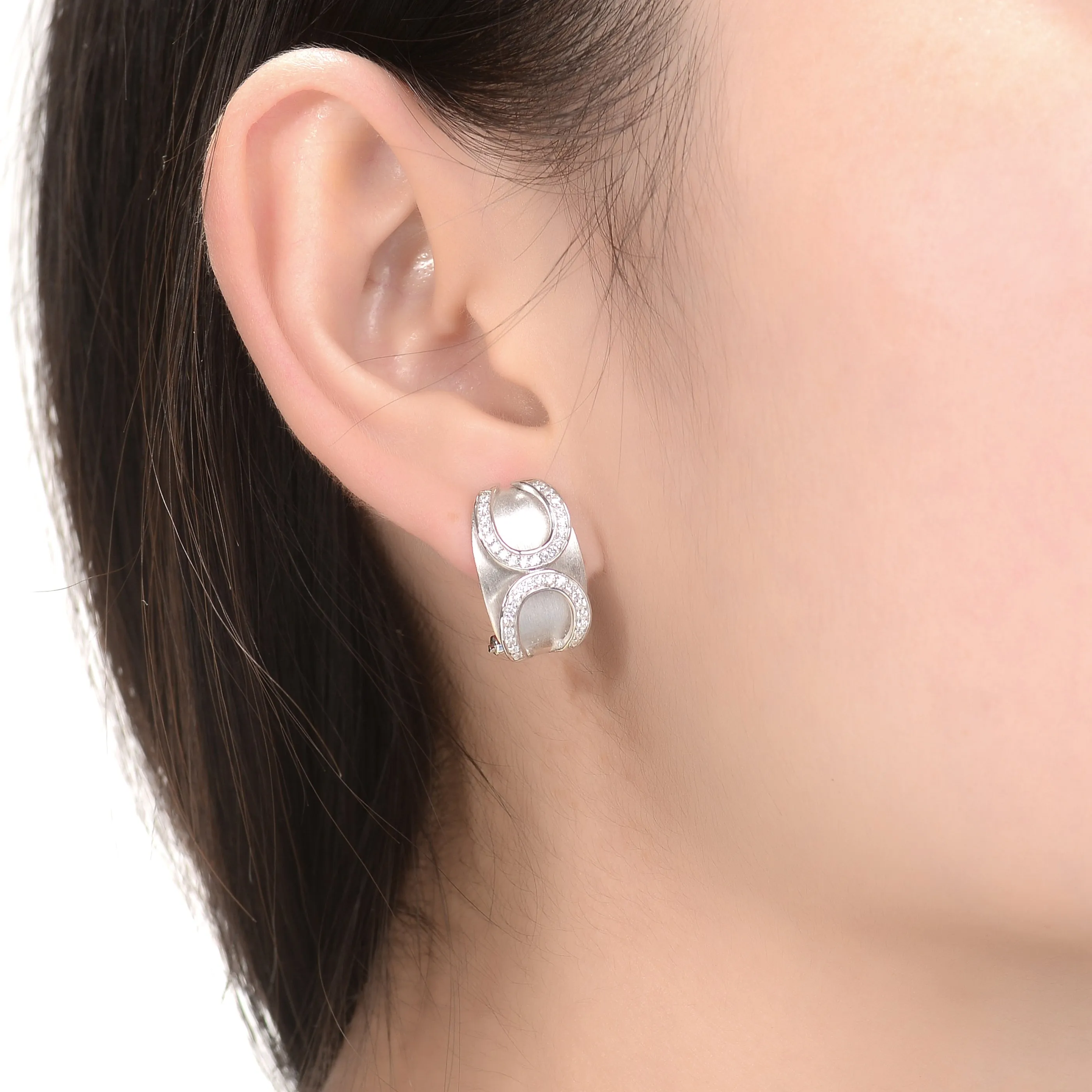 Sterling Silver Infinity-Inspired White Cubic Zirconia Accent Huggies Earrings