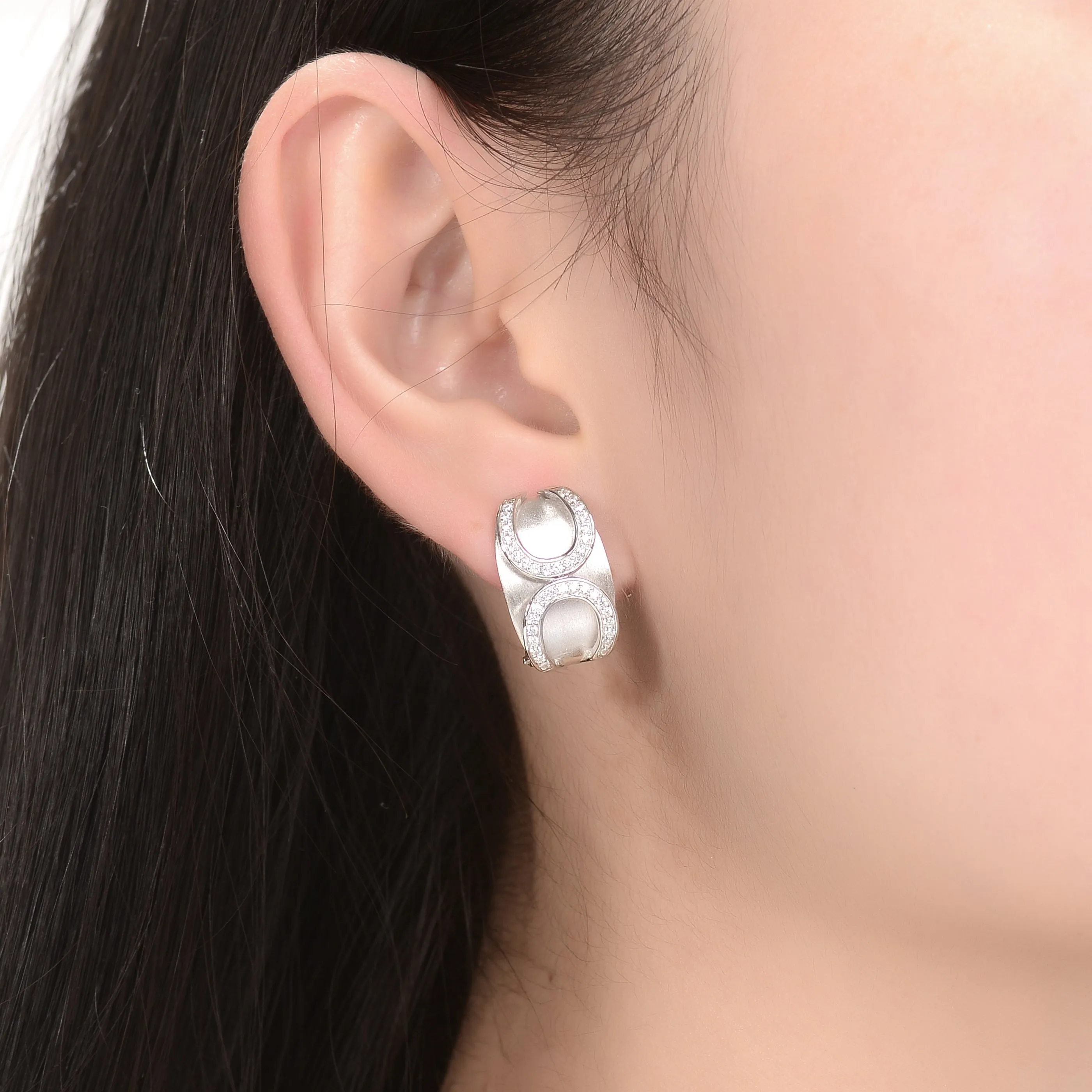 Sterling Silver Infinity-Inspired White Cubic Zirconia Accent Huggies Earrings
